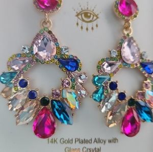 Earrings by eye candy New in box